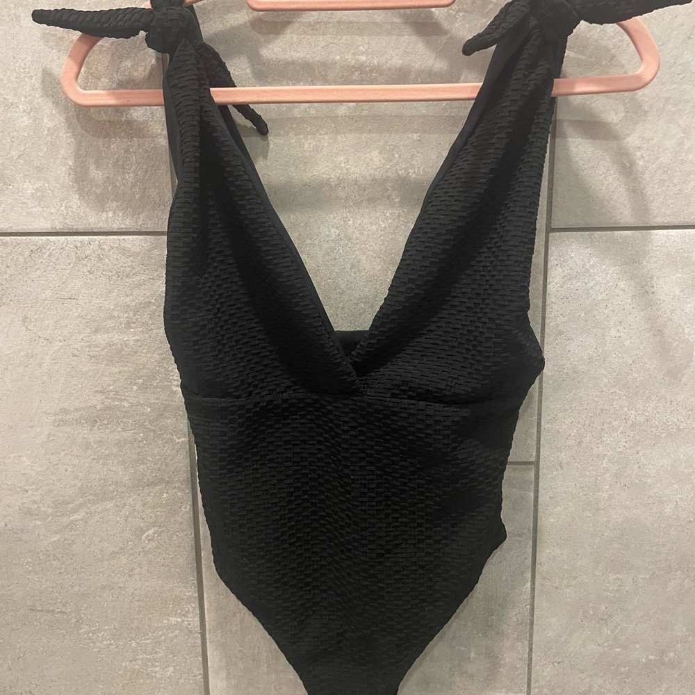 New with tags Infamous Swimwear Violet One piece - Black waffle. Never worn
